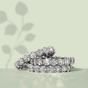 Set of diamond rings on a light green background