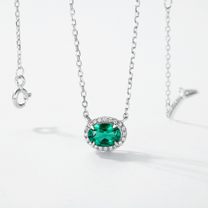 Oval Emerald Halo Pendant Necklace