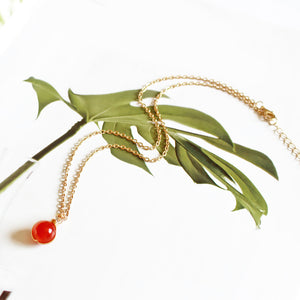 Collana con pendente sfera in pietra di cristallo naturale