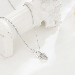 Interlocking Mobius Ring Charm Necklace