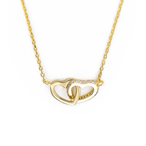 Collana con pendente a cuore intrecciato in oro