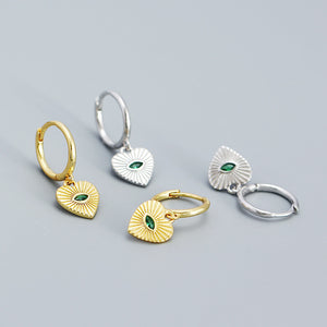 Creolen mit Herzanhänger und bösem Blick