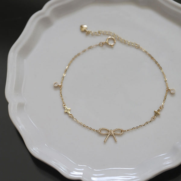 Gold Bow Four-Leaf Clover Bracelet
