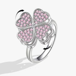 Rosafarbener Fidget Spinner-Ring mit vierblättrigem Kleeblatt