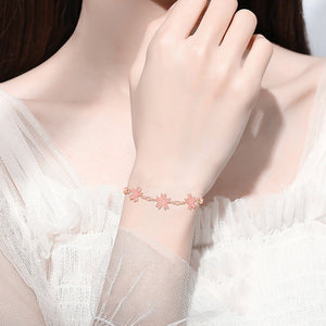 Armband mit rosa Kirschblütenanhänger