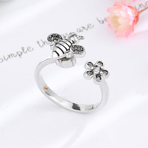 Anneau anti-anxiété en forme d'abeille et de fleur