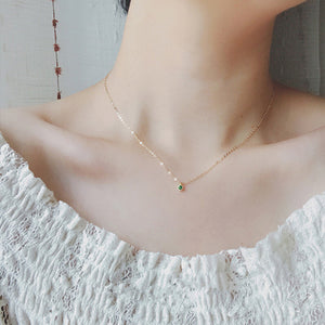 Halskette mit Smaragdanhänger im Rundschliff