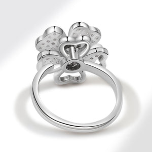 Rosafarbener Fidget Spinner-Ring mit vierblättrigem Kleeblatt