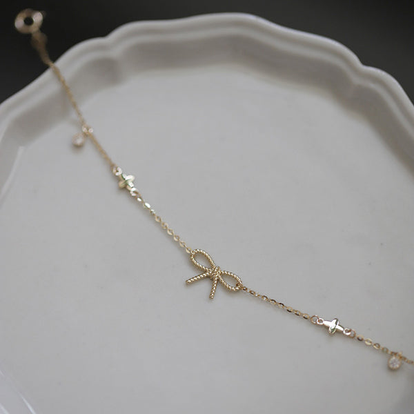 Gold Bow Four-Leaf Clover Bracelet