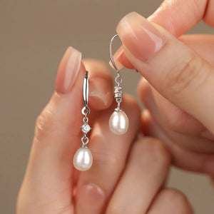 Boucles d'oreilles pendantes baroques en perles