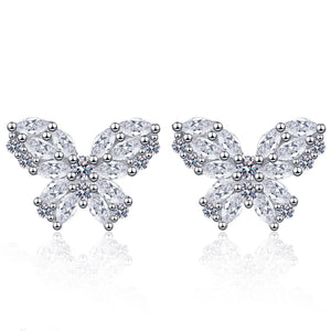 Boucles d'oreilles à tige rondes en moissanite et fleur de rose