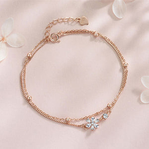 Bracelet double chaîne en fleur de cerisier