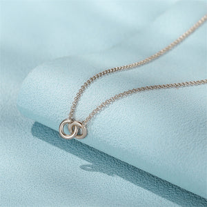 Interlocking Mobius Ring Charm Necklace