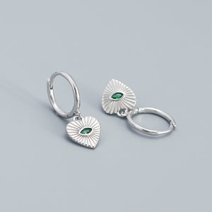 Creolen mit Herzanhänger und bösem Blick