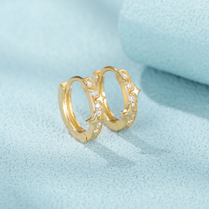 Zarte goldene Stern-Creolen