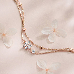 Bracelet double chaîne en fleur de cerisier