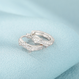 Zarte goldene Stern-Creolen