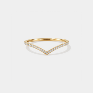 Gold ring with small moissanite on a white background