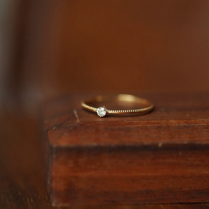 Dainty solitaire single diamond gold milgrain thin band ring