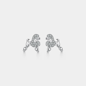 Sterling silver poodle stud earrings with pavé-set clear stones, shown as a matching pair on a white background.