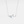 Silver sea turtle necklace with a blue gemstone pendant on a light gray background
