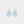 Starfish-shaped earrings with light blue circular pendants on a white background