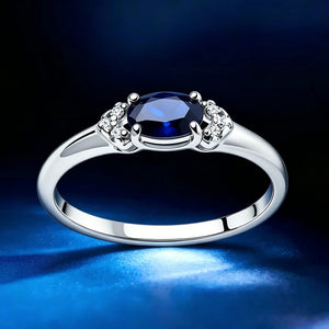 Blue Oval Solitaire CZ Side Cluster Band Ring