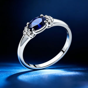 Blue Oval Solitaire CZ Side Cluster Band Ring