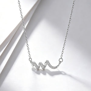 Pave CZ Twist Ribbon Wave Pendant Necklace