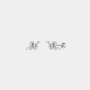 A pair of screw back crawler earrings designed to resemble a snake, with a white gold plating on sterling silver, displayed against a white background.