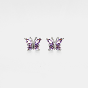 A pair of silver stud earrings in the shape of butterflies with purple cubic zirconia bodies.
