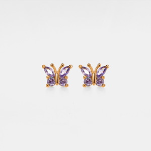 A pair of rose gold stud earrings in the shape of butterflies with purple cubic zirconia bodies.