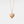 Rose gold heart-shaped locket pendant with paw print design on a light gray background