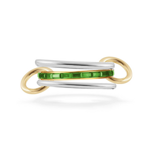 Mixed metal gold silver linked stackable ring, three interlocked layered bands, channel set emerald green baguette cut crystal in gold center band, modern minimalist statement everyday jewelry for women