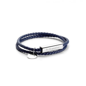 Navy braided bracelet with a silver tag on a white background