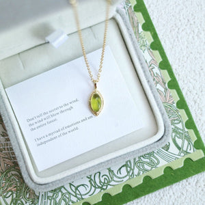 Green Oval Peridot Engraved Charm Necklace