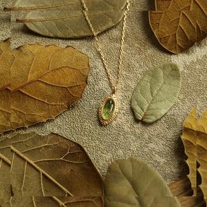 Green Oval Peridot Engraved Charm Necklace