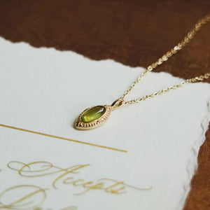 Green Oval Peridot Engraved Charm Necklace