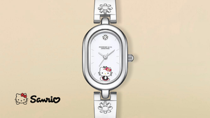 Hello Kitty watch with Pomellato branding on a beige background