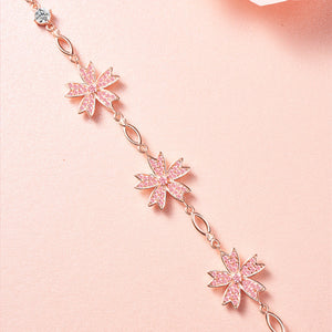 Armband mit rosa Kirschblütenanhänger