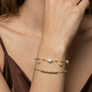 Dainty Pearl Starburst Celestial Charm Bracelet