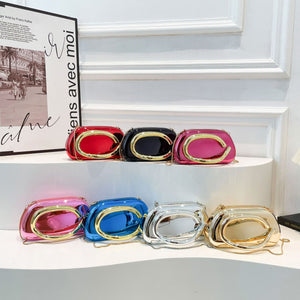 Metallic Curved Oval Hard Shell Clutch Bag