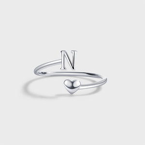 Stapelbarer Bypass-Ring mit Herz-Anhänger