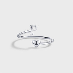 Stapelbarer Bypass-Ring mit Herz-Anhänger