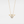 Gold necklace with a pendant featuring a pearl on a light gray background