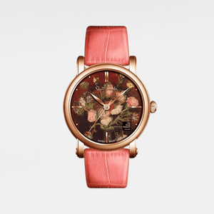 Watch with pink strap and floral design on a white background