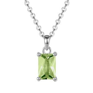 Silver necklace with a green gemstone pendant on a white background