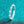 Silver ring with gemstones on a teal background
