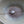 Pearl necklace on a textured surface