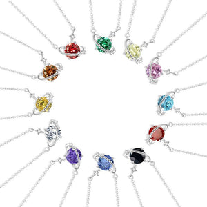 Collection of silver necklaces with colorful gemstones on a white background